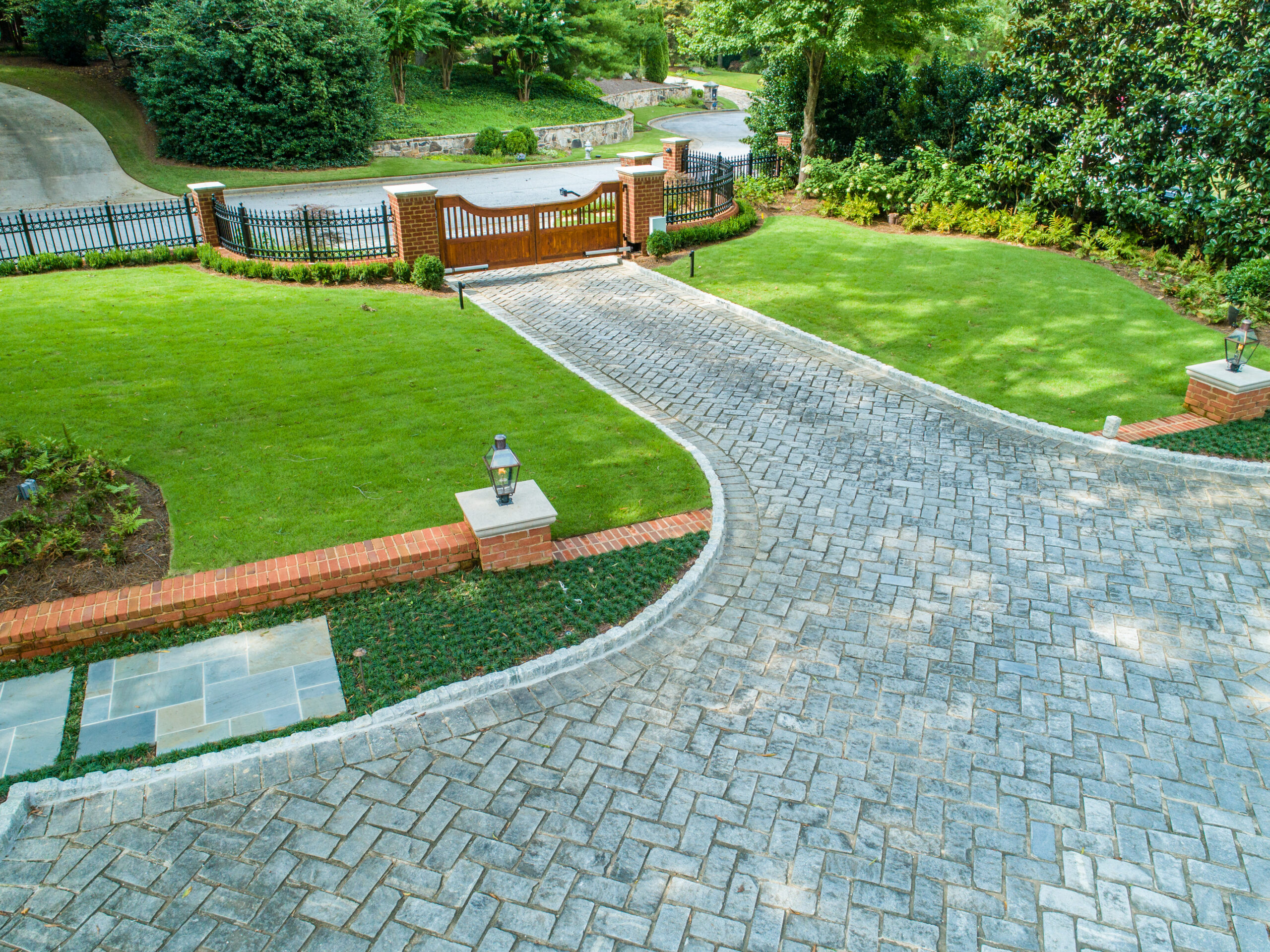 Finished masonry and driveway details showing precise site planning